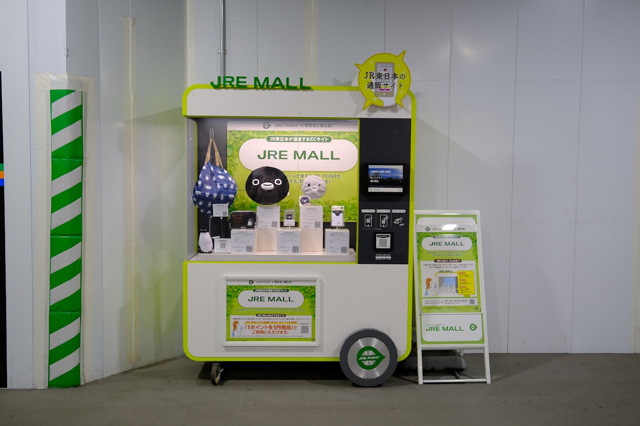 JRE Mall vending machine displaying various items at Shibuya Tokyo station, Japan's unique retail experience.